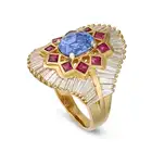 A FRENCH SAPPHIRE, RUBY AND DIAMOND DRESS RING in 18ct yellow gold, set with an oval cut sapphire of