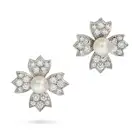 TIFFANY & CO., A PAIR OF PEARL AND DIAMOND FLOWER EARRINGS, 1994 each designed as a flower set