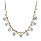 A VINTAGE AQUAMARINE AND WHITE SAPPHIRE NECKLACE comprising a row of fancy links set with round