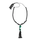 AN ONYX AND JADEITE JADE TASSEL NECKLACE comprising rows of polished and facetted onyx beads,