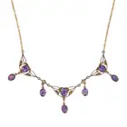 NO RESERVE - AN ANTIQUE ART NOUVEAU AMETHYST NECKLACE in 9ct yellow gold, set with oval cut