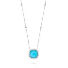 A TURQUOISE AND DIAMOND PENDANT NECKLACE the pendant set with a cabochon turquoise in a cluster of