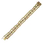 A VINTAGE GOLD BRACELET in 14ct yellow gold, comprising rows of interlocking fancy links, stamped