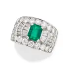BULGARI, AN EMERALD AND DIAMOND RING in platinum, set with an octagonal step cut emerald of 1.45