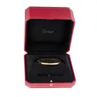 CARTIER, A SMALL MODEL LOVE BANGLE in 18ct rose gold, the hinged bangle punctuated by ten screw head