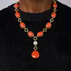 CHANEL, A FINE CORAL AND PEARL PENDANT NECKLACE, CIRCA 1980 in 18ct yellow gold, comprising a row of