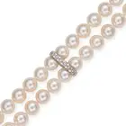 MIKIMOTO, A FINE AKOYA PEARL AND DIAMOND BRACELET in 18ct white gold, comprising two rows of pearls,