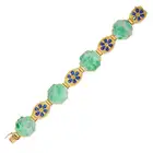 AN ITALIAN JADEITE JADE AND ENAMEL BRACELET in 18ct yellow gold, set with four hexagonal jadeite