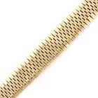 A GOLD BRACELET in 9ct yellow gold, the tapering strap bracelet comprising fancy links, full British
