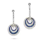 A PAIR OF DIAMOND AND SAPPHIRE DROP EARRINGS each suspending a round brilliant cut diamond within