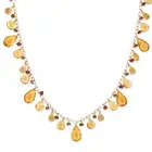 NO RESERVE - A CITRINE AND GARNET FRINGE NECKLACE in 14ct yellow gold, comprising a chain,