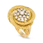 A DIAMOND DRESS RING set with a cluster of round brilliant cut diamonds totalling 0.6-0.7 carats,