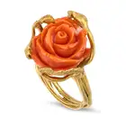 AN ITALIAN CORAL ROSE RING in yellow gold, set with a carved coral rose, the band in stylised