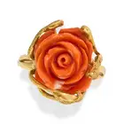 AN ITALIAN CORAL ROSE RING in yellow gold, set with a carved coral rose, the band in stylised
