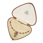 AN ANTIQUE PINK TOURMALINE, PERIDOT, PEARL AND DIAMOND PENDANT NECKLACE, EARLY 20TH CENTURY the