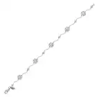 A DIAMOND BRACELET comprising clusters of round brilliant cut diamonds and round brilliant cut