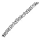 A FINE VINTAGE DIAMOND BRACELET, CIRCA 1950'S comprising a row of scrolling links set with
