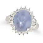 NO RESERVE - A 13.03 CARAT STAR SAPPHIRE AND DIAMOND RING set with a cabochon star sapphire of 13.03