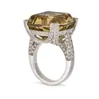 ASPREY, A CITRINE AND DIAMOND DRESS RING set with a cushion cut citrine of approximately 25.00