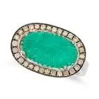 A CARVED EMERALD AND DIAMOND RING set with a carved cabochon emerald of 4.69 carats, within a border