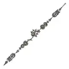 AN ANTIQUE GEORGIAN DIAMOND JEWEL in silver, comprising a row of five foliate motifs set with rose