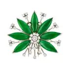 A FINE VINTAGE JADETE JADE AND DIAMOND FLOWER CLIP BROOCH designed as a flower head, set to the
