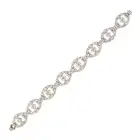 A FINE ART DECO DIAMOND BRACELET in platinum, comprising a series of openwork geometric links set