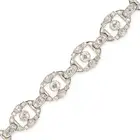 A FINE ART DECO DIAMOND BRACELET in platinum, comprising a series of openwork geometric links set