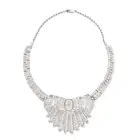 A DIAMOND COLLAR NECKLACE in silver, the stylised scrolling necklace set throughout with round