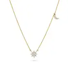 A CELESTIAL DIAMOND NECKLACE comprising a trace chain accented by a star and crescent moon motif set