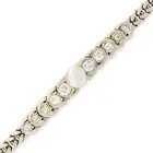 A VINTAGE NATURAL FRESHWATER PEARL AND DIAMOND BRACELET set with a pearl of 10.0mm, accented by a