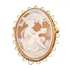 NO RESERVE - AN VINTAGE SHELL CAMEO BROOCH, 1979 in 9ct yellow gold, set with an oval shell cameo