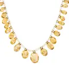 A CITRINE AND PEARL FRINGE NECKLACE comprising a single row of seed pearls, suspending a