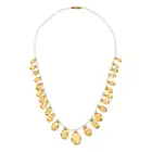 A CITRINE AND PEARL FRINGE NECKLACE comprising a single row of seed pearls, suspending a