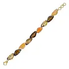 VIANNA, A SMOKY QUARTZ, CITRINE, CARNELIAN AND DIAMOND BRACELET comprising a row of mixed cut