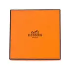 NO RESERVE - HERMES, AN ENAMEL BANGLE the bangle designed with a scrolling blue Hemres Paris ribbon,