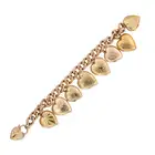 AN ANTIQUE GOLD HEART LOCKET CHARM BRACELET in yellow and rose gold, comprising a curb chain