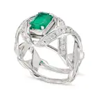 SCHLUMBERGER FOR TIFFANY & CO., AN EMERALD AND DIAMOND RING set with an octagonal step cut emerald