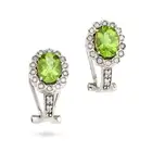 A PERIDOT AND DIAMOND RING AND EARRINGS SUITE the ring set with an oval cut peridot of approximately
