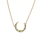 A PEARL AND EMERALD CRESCENT MOON NECKLACE the pendant designed as a crescent moon set with pearls