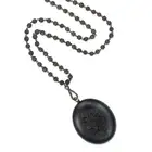 NO RESERVE - AN ANTIQUE VICTORIAN JET LOCKET PENDANT NECKLACE, 19TH CENTURY the oval hinged locket
