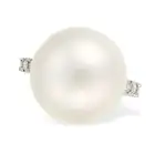 A SOUTH SEA PEARL AND DIAMOND RING set with a South Sea pearl of 16.0mm, the eternity band set all