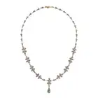 AN ANTIQUE DIAMOND AND BLACK PEARL PENDANT NECKLACE the necklace in foliate design, set throughout