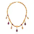 ALFRED PHILIPS, A FINE ANTIQUE IMPERIAL TOPAZ AND GARNET NECKLACE in yellow gold, comprising a row