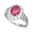 NO RESERVE - A FINE UNHEATED RUBY AND DIAMOND RING set with an oval cut ruby of 2.00 carats in a