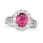 NO RESERVE - A FINE UNHEATED RUBY AND DIAMOND RING set with an oval cut ruby of 2.00 carats in a