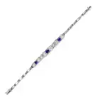 AN ANTIQUE SAPPHIRE AND DIAMOND BRACELET, EARLY 20TH CENTURY the central panel set with three