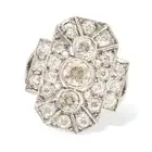 AN ART DECO DIAMOND DRESS RING the geometric ring set with three principal old European cut