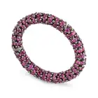 DEMEGLIO, A RUBY FULL ETERNITY RING in 18ct gold, pave set all around with round cut rubies
