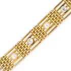 AN ANTIQUE PEARL AND DIAMOND BRACELET in 15ct yellow gold, comprising a row of gate links set with
